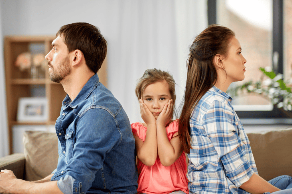 Divorce couple with child in the middle