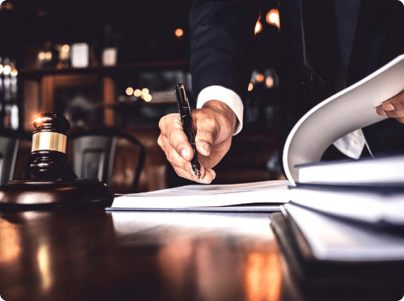 A man signing documents