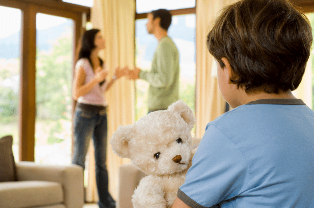 A boy facing his fighting parents