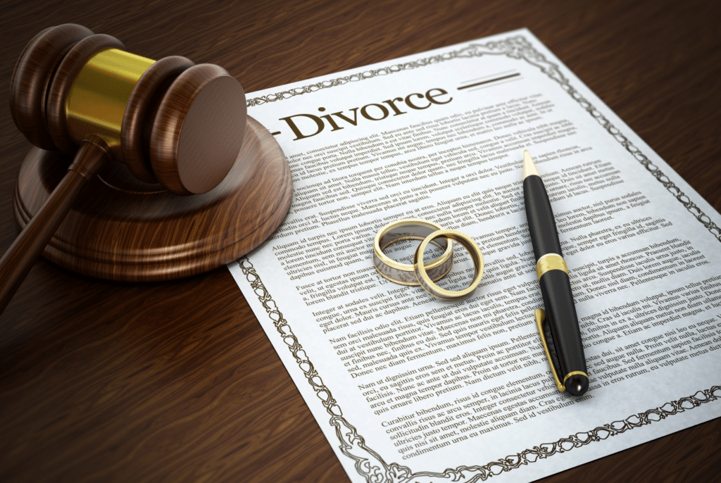 A gavel on top of a divorce document