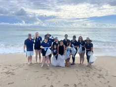 The Travis Walker team at the beach