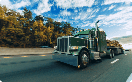 A commercial truck driving on the interstate