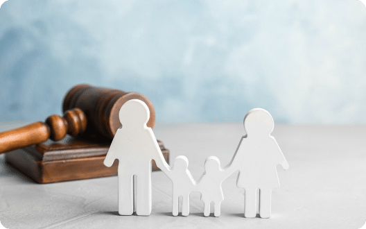 A model of a family behind a gavel